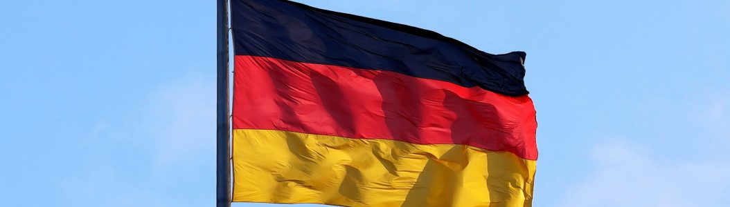 © Photo by Mark König/Unsplash/
(Flag of Germany.)